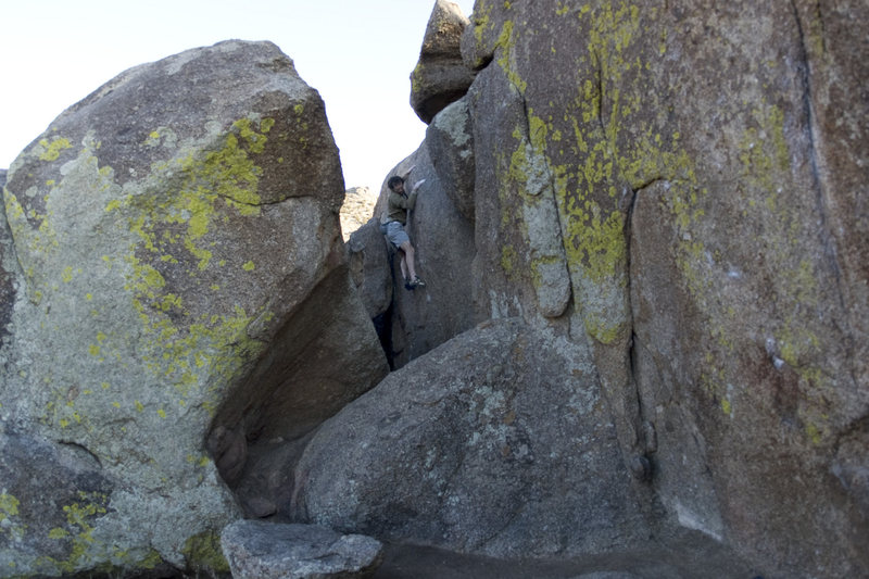 ...and more slopers. The topout consists of a scrunchy mantle to a leftward traverse in a horizontal hand crack, avoiding a boulder that wants to bump you in the head.