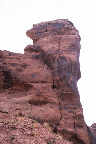 Roadside Fling Tower.<br>
<br>
The Things We Do for Love follows the left of the two crack systems to the notch before moving back out onto the face and following cracks up and right to the summit.