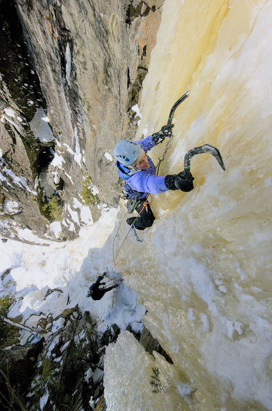 Orient Bay, Canada. Kate Muehling leading the crux pitch of Obsession. March '09.