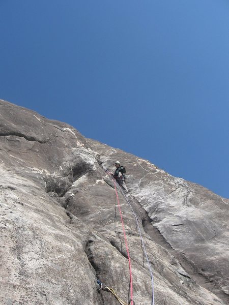 Ryan at the good stance a few moves below the P6 crux...thinking on it.