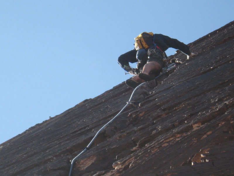 Half way up the last pitch, this whole crack is very featured, great hold and footers, easy to place gear. Just above the crack ends into some tough slab, which is protected with a bolt at the crux.