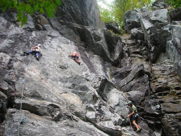 Dunno names but I believe the lines being climbed are 5.7 on the left and two 5.9's on the right. Iron Man? is the crazy looking roof in the upper left hand corner 