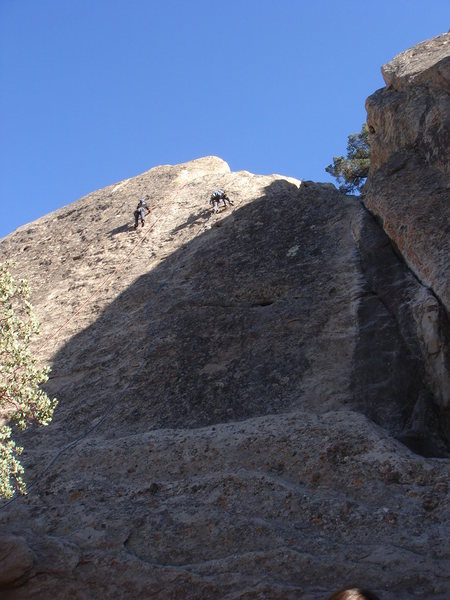 Climbers on the short slab, east end of VD wall.