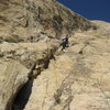 Half way up the 160' first pitch out of the slot canyon. Photo Pat Moe