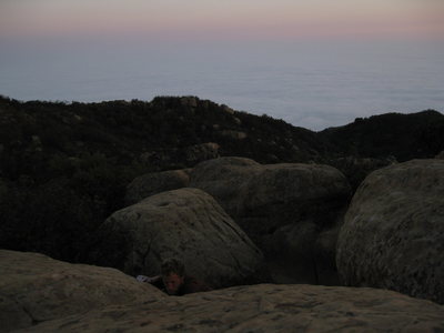 Cloudy below in Santa Barbara, but a beautiful evening at the Mouth.  Here Shawn is topping out Panic in the streets.
