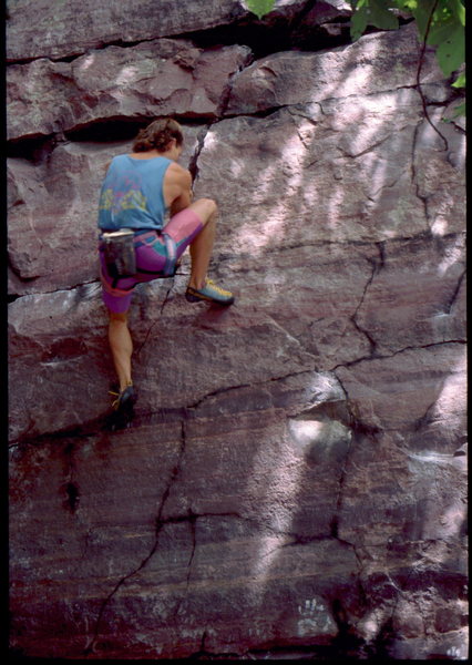 John McMullen bouldering at the Tombstone Wall Area, Devil's Lake, WI. Photo Bob Horan