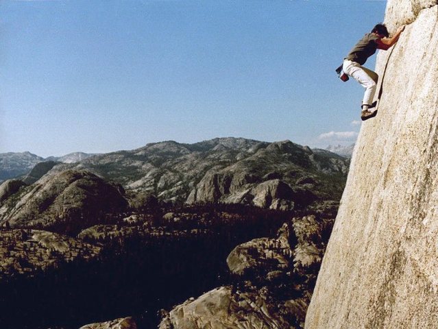 Paul Parker on a solo of On the Lamb 5.9, a 500 foot long traverse on Lamb Dome - Tuolumne Meadows, Yosemite NP<br>
