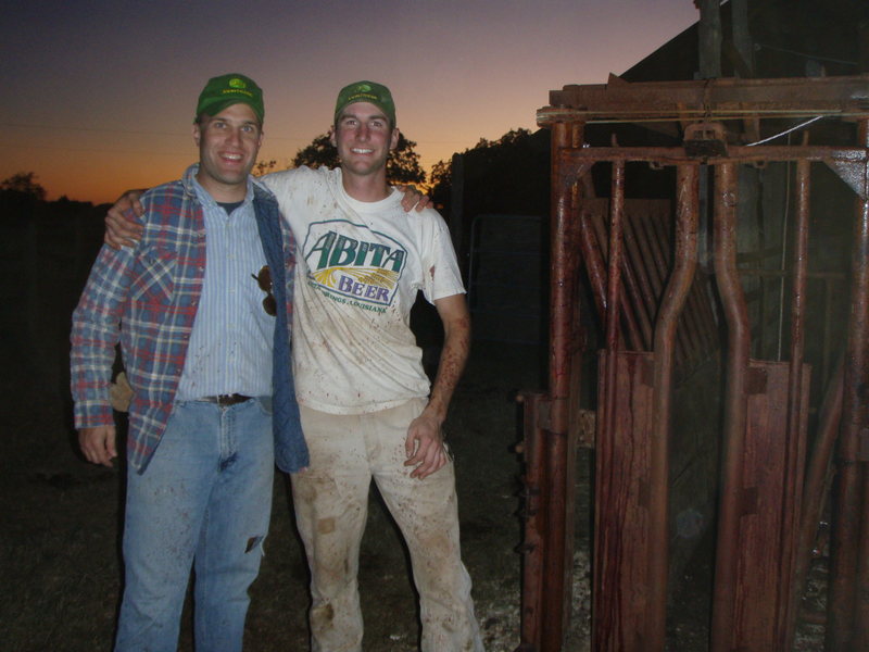 My sister's new husband and I after his first working.  We're sporting matching John Deere hats we got from Mom's side of the family in Alberta.  He's one helluva awesome fella...