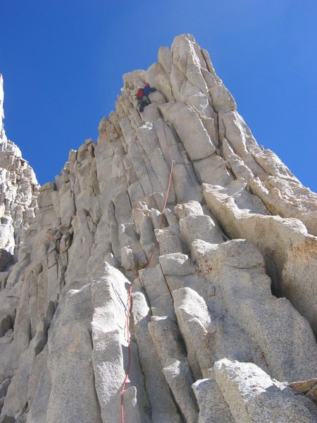 Eric near the crux 5.9 on pitch 3.