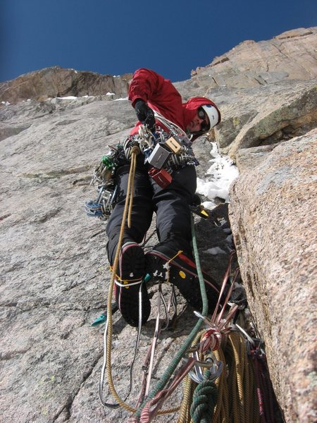 Chris Sheridan leading up the second pitch of Shining Slab on 5-10-09.  We tried to link this climb to D7 but were turned around on the third pitch by steep featureless slabs covered in loose snow.  The roof of The Grey Pillar can be seen in the upper left, while The Diamond can be seen high above to the upper right.