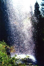 Looking back through the ephemeral falls next to the cave just behind All Work and No Play and Doggy Llama.