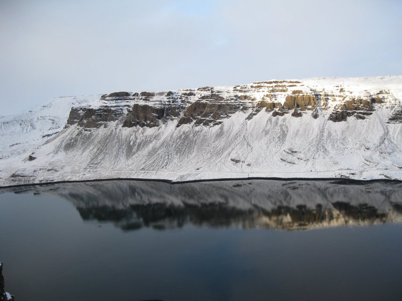 Looking across the Fjord from the climbs, you can see the road at the base of the cliffs. 