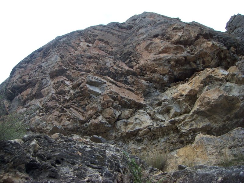 Pre Op climbs the open book dihedral in the middle of the photo. Surgery Buttress, Glenwood Canyon.