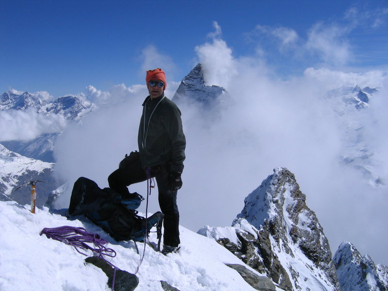 Summit of the Dent d'Herens after climbing its East crest in winter