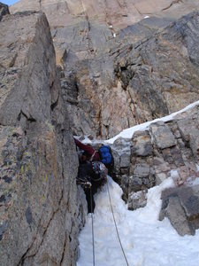 Ty Cook working out a steep step on the second pitch of The North Chimney on Longs Peak.  Photo by Chris Sheridan, 5-18-09.
