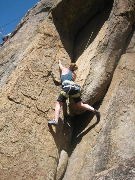 Tish heading up the dihedral under the roof [Photo by Jason Refuerzo]