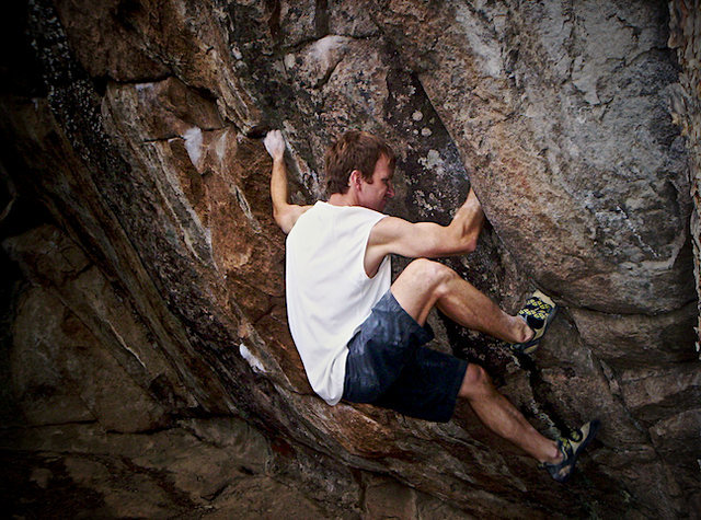 Stan Zborovski on "Less Than Thievery" (V4) at the Energy Wall.  Three Sister Park, Colorado.