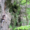 Dustin working towards the overhang.  No idea where we were, Mike suggested we were on "Boneless Chicken Wing" wall.  There were ~6 bolted routes, including an easy one on a detached flake.