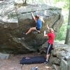 hannah trying to figure out the top-out crux.