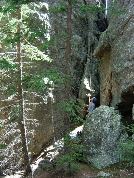 This is what the belay area below the route looks like from the trail that goes by.  