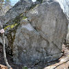 Is this another view of this boulder?  It's to the left of Poppy Cock & Vag....Jim Merli climbed the left arete & thought it might be an FA...but in this place, who knows anyways...