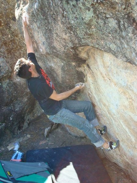 Gary Carns in the action during a 90 degree F bouldering session...