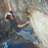 Gary Carns in the action during a 90 degree F bouldering session...