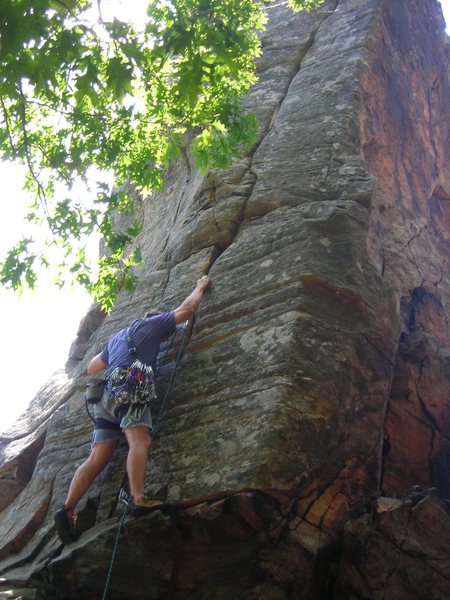 Climbing just the right crack of Hydroponics, Coyote Tower, Neceedah, WI.  By Eric Landmann.