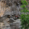 Moving into the mysterious low flare crux...  This section has shut down many an onsight attempt!<br>
My tall boy beta is to layback the flare pinch facing left. There are a couple different crimps out right to balance, and then a small dead point to a wrapper jug, which is still to the right of the flare....