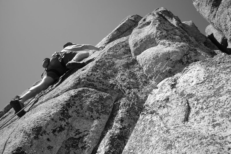 Past the crux of Children Should Not Use Powertools 5.10b.<br>
Photo by Agina