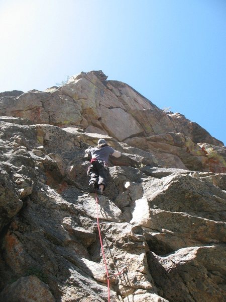 Past the crux on Community Service (5.10a), 8000 Foot Crag.