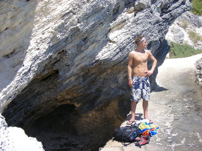 Alex Plots looking quite stoic above the cave.  We found this cave to have the best quality rock, however it's still pretty soft.  