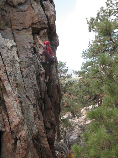 Stephanie nearing the crux of Lady Luck (5.9), Holcomb Valley Pinnacles.