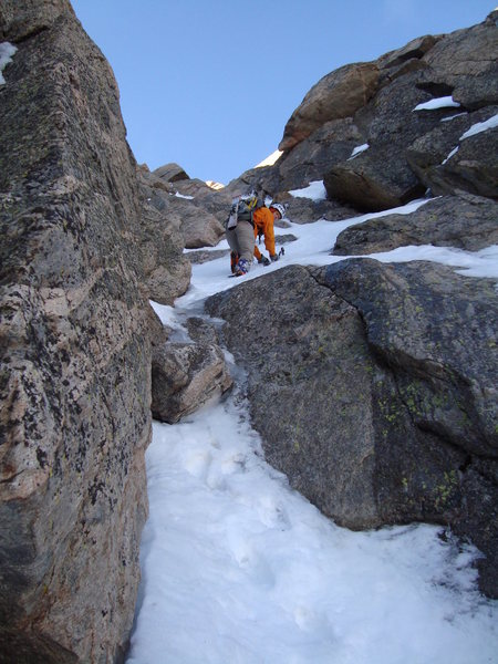 The start of the 4th class rock/snow/ice mixed section near the top of the route.