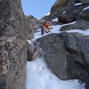 The start of the 4th class rock/snow/ice mixed section near the top of the route.