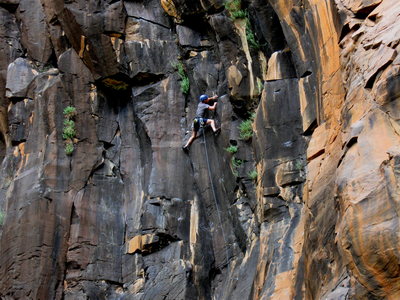 Mike Sokoloff surfing into the steep section on his onsight of Speaking in Tongues 5.11+.