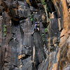 Mike Sokoloff surfing into the steep section on his onsight of Speaking in Tongues 5.11+.