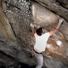 Jason makes the hug stick on the classic problem "Thievery."  The Energy wall at Three Sisters Park, Colorado.