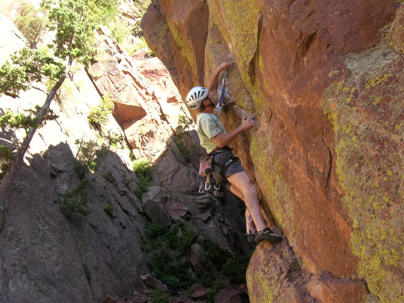 Steve plugs in his gear before the crux section.  Yes! Those are Aliens!