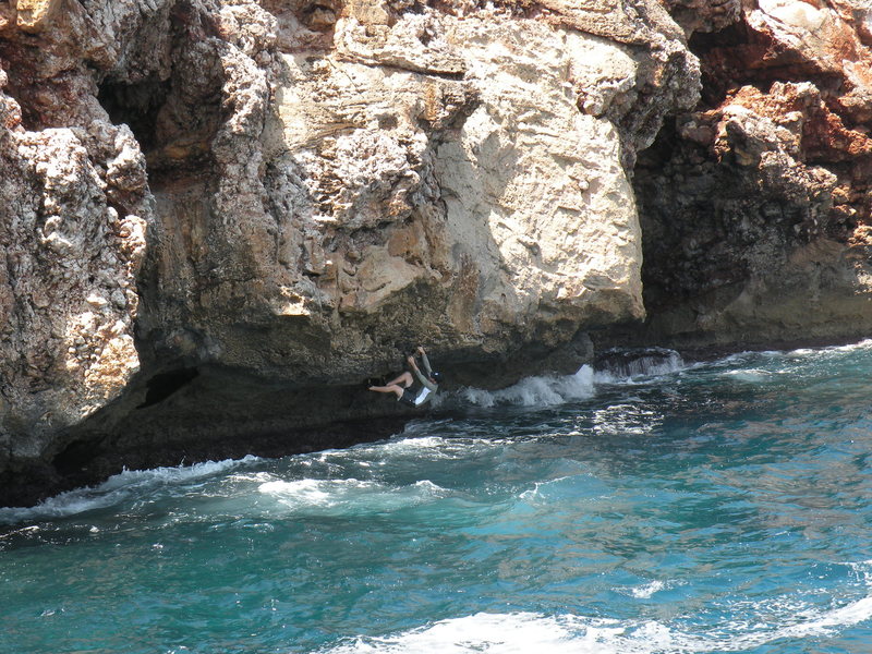 Climbing through the crux start.