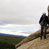 Rob Kelman, walking back to the bolts at the top of Walt's Wall. Because of the wet rock, we did rope up for the section.