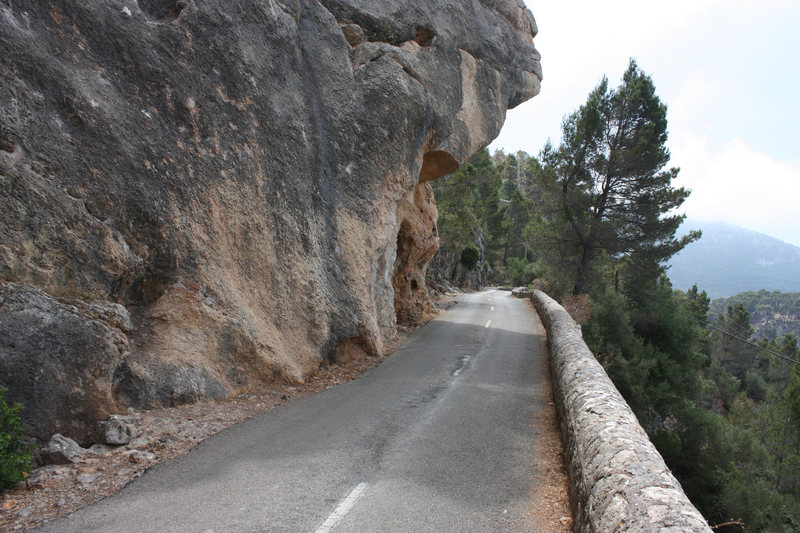 The pullout is just to the left of this photo. Routes are bolted all along this face into the cave to the right.