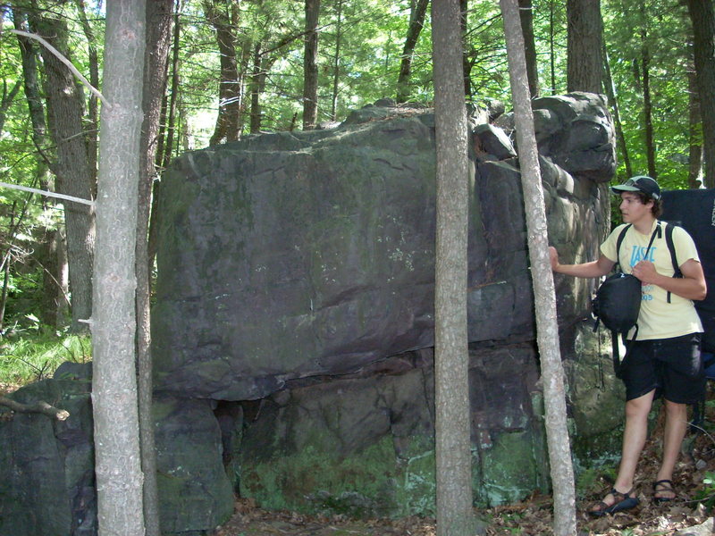 First boulder you will see at Steinke Wall IF traveling from Cibola Wall or Triple Towers Wall. 