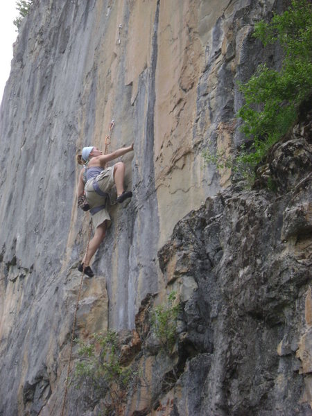 Climbing the 11a on lead - right at the Crux