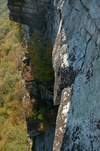 Tricia following the P-1 traverse, with the Andrew corner below.