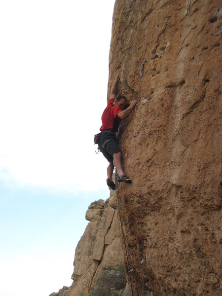 Moving right to join the original Gym Arete.  There's no "thank God" rest after the opening boulder problem, which keeps the upper arete thrilling to the end.