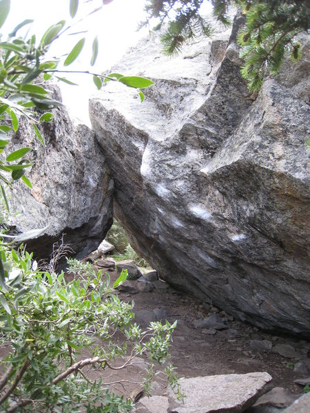 This is the view of the Bierstadt boulder when you first arrive.  Bierstadt, V10, climbs the left line.  The right line, ending in the V-notch, is Ludder's Pinch.  The Boulder opposite hosts "Thing Across from Bierstadt".  Timeline is on the south face of the Bierstadt boulder.