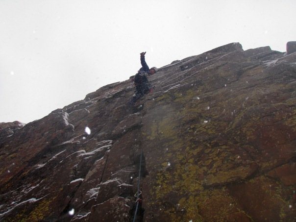 Breaking out the aid slings on a winter ascent of The Fiver