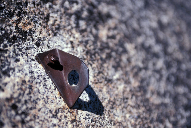 Leaving aside the effects of the fire for a moment, beware of the fixed gear at this site.  This picture shows one of the lead bolts on the second pitch of Elephantiasis.  Aging gear, such as this, is not uncommon on Elephant Knob.