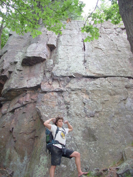 Skinner is standing under "Elimination" 5.6, then on the right is a 5.10a face. 